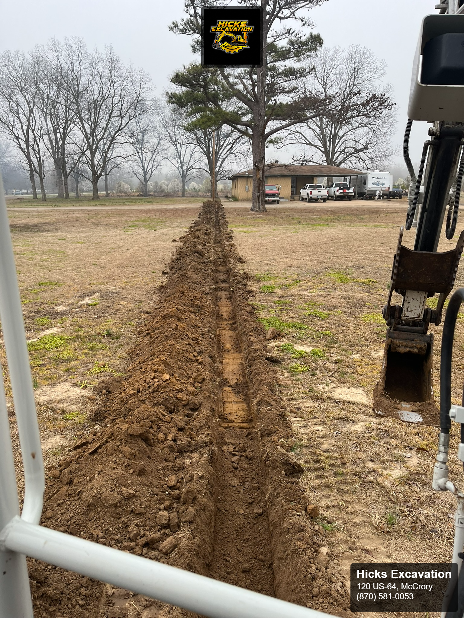 Professional ditch digging and trenching services by Hicks Excavation for residential property drainage.